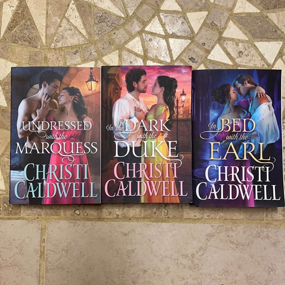 3 large print Romance novels.